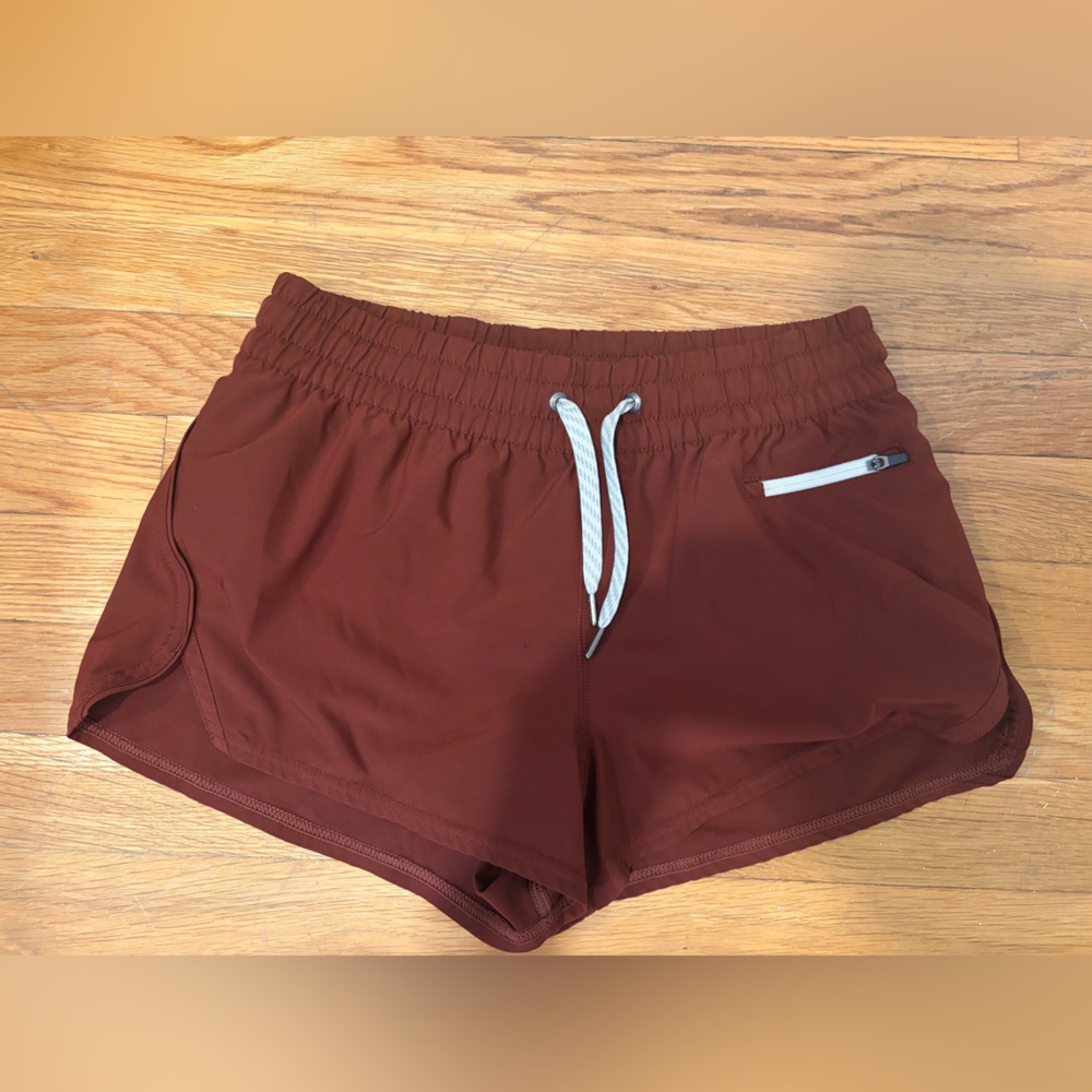 Vuori women’s burgundy running shorts
